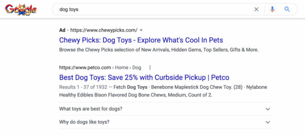 SEO vs PPC: example of organic and paid result in Google
