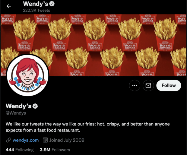 Wendy's optimized Twitter profile with images and catchy bio