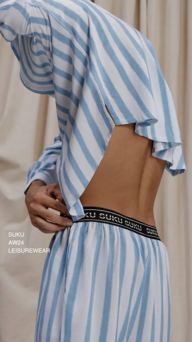 Suku leisurewear model showing striped matching set