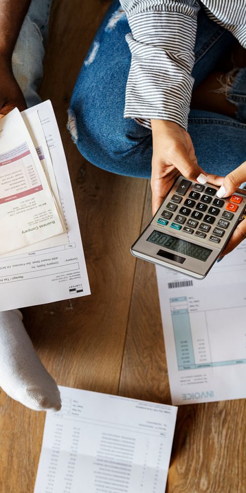 Couple figuring out how to get out of debt quickly