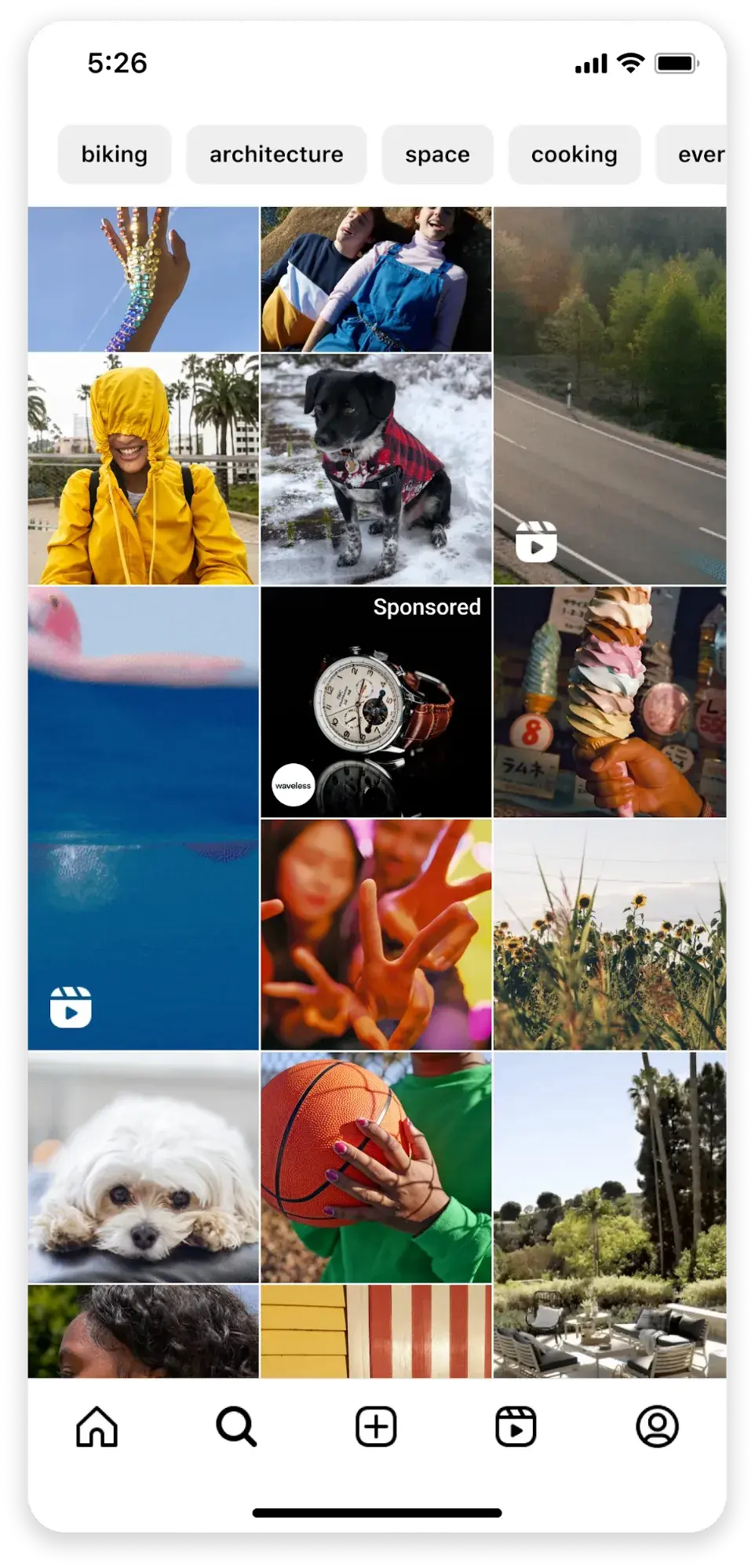 screenshot of tiles on an instagram “explore” page, with a sponsored tile in the center.