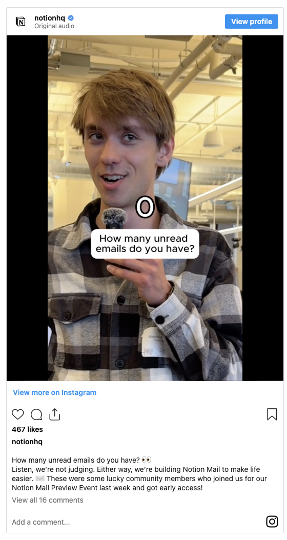 Notion employee conducting street interview about email management with handheld microphone