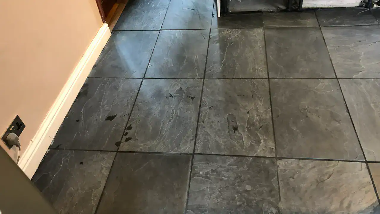 Cleaned slate kitchen floor after grout residue removal, ingrained soil were removed giving an even finish.